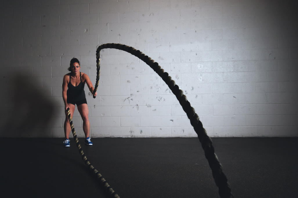 Woman Holding Exercise Ropes